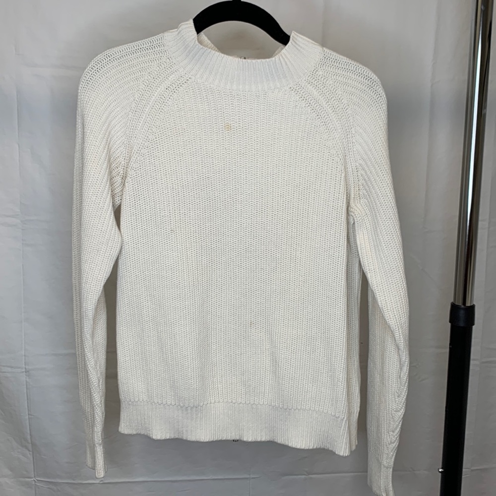 White knit sweater with zipper back